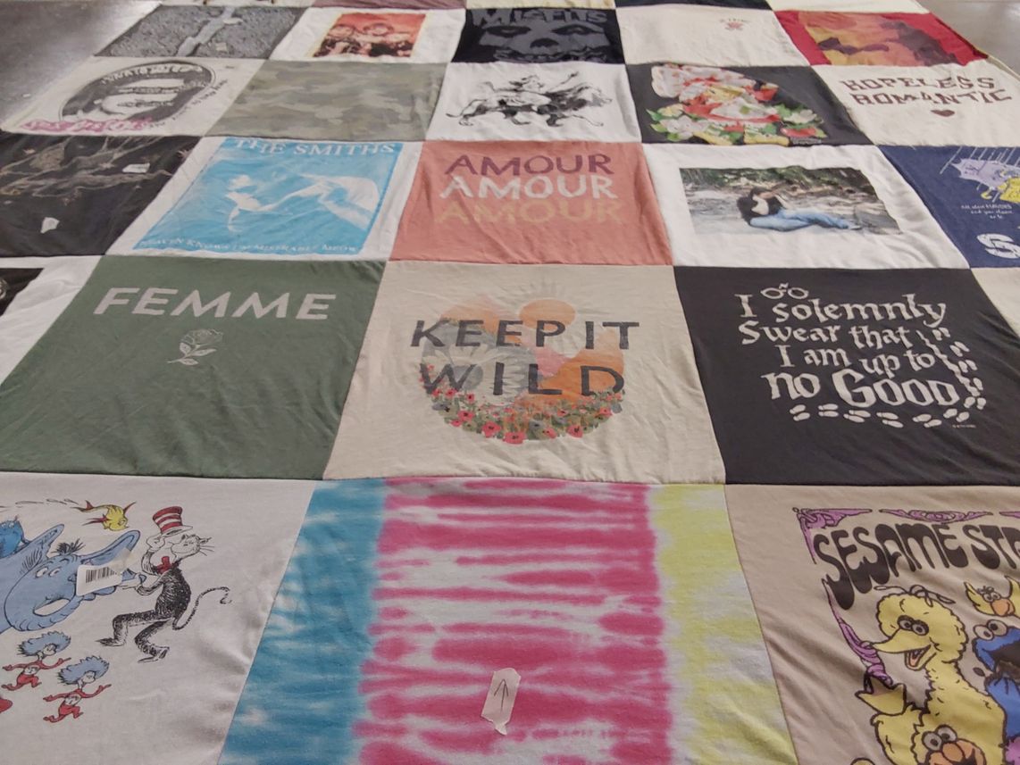 T-shirt quilt with music, literature themes by Matthew from CA