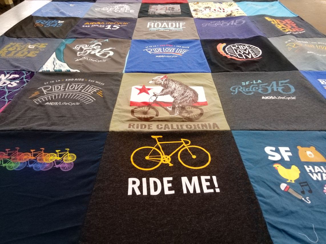 T-shirt quilt with cycling, charity themes by Stephen from IN