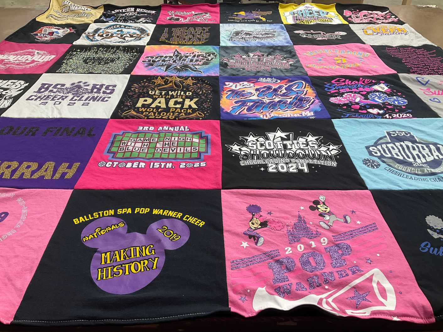 T-shirt quilt with cheerleading themes by Emily from NY