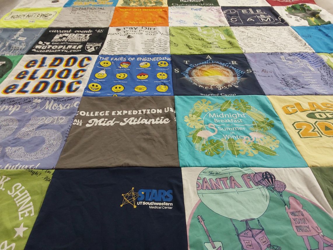 T-shirt quilt with education, science themes by Shirin from TX