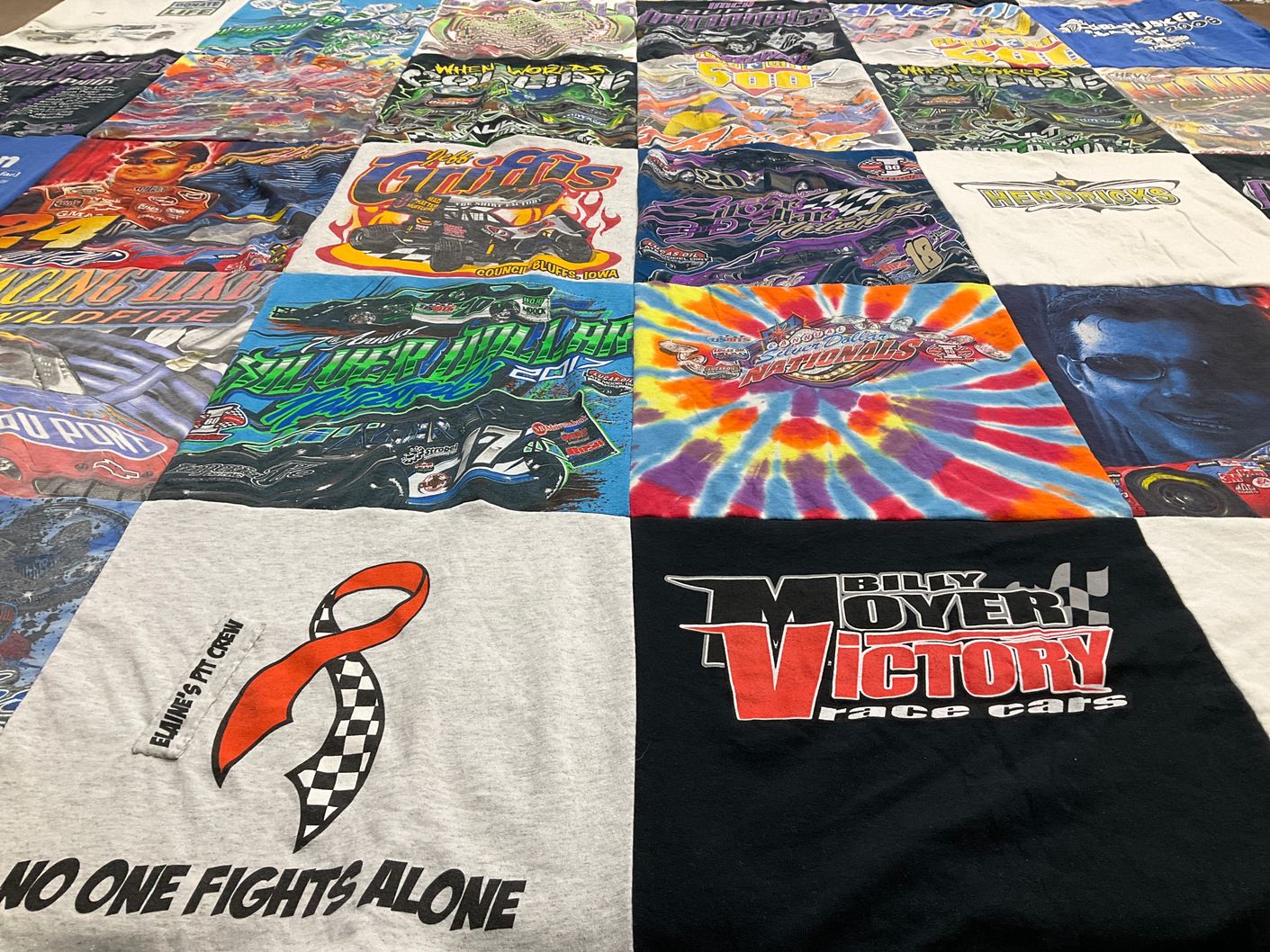 T-shirt quilt with racing themes by Elaine from IA