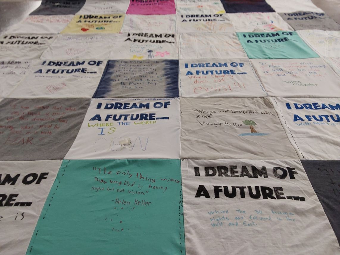 T-shirt quilt with social justice, human rights themes by Mario from UT