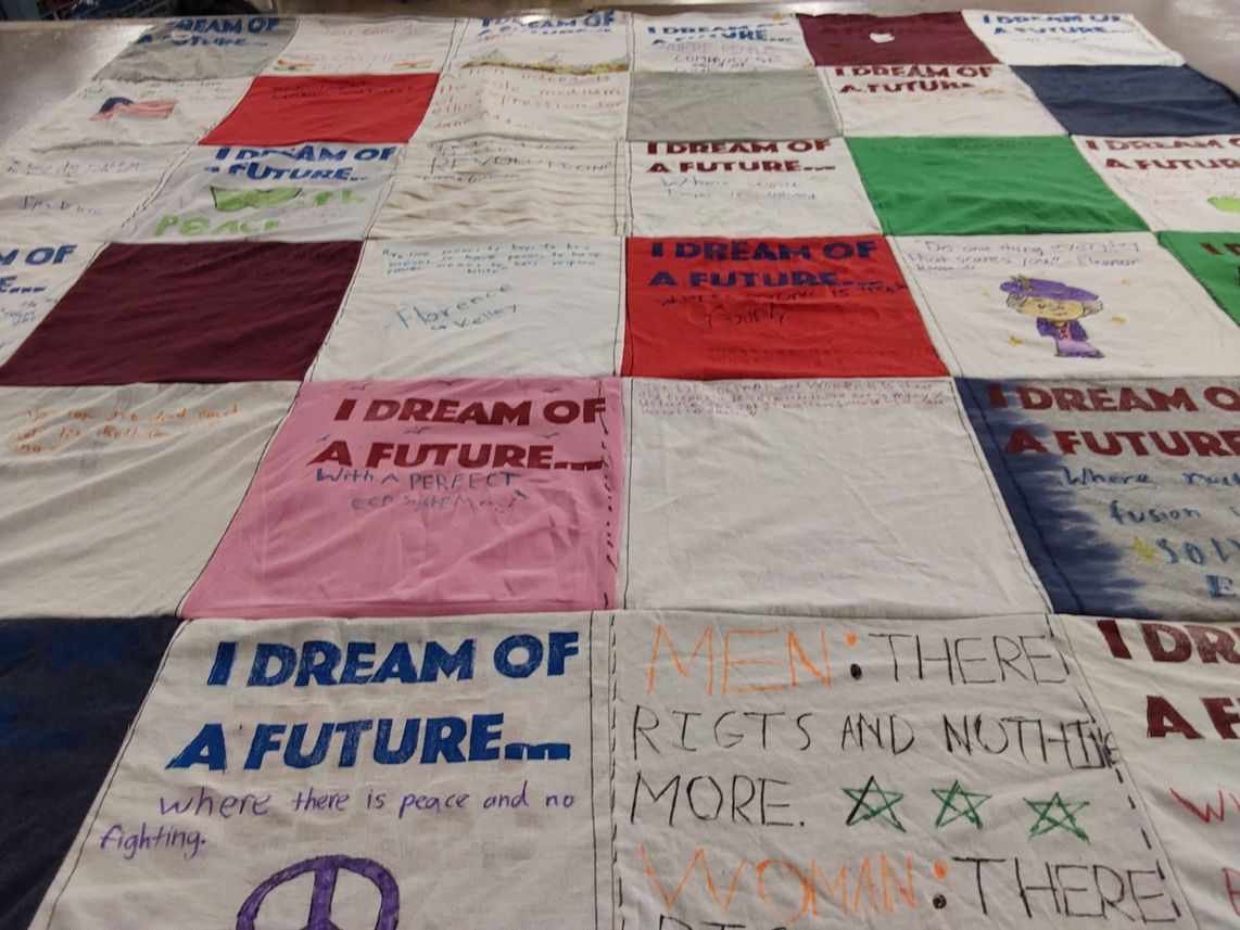 T-shirt quilt with social justice, peace themes by Mario from UT