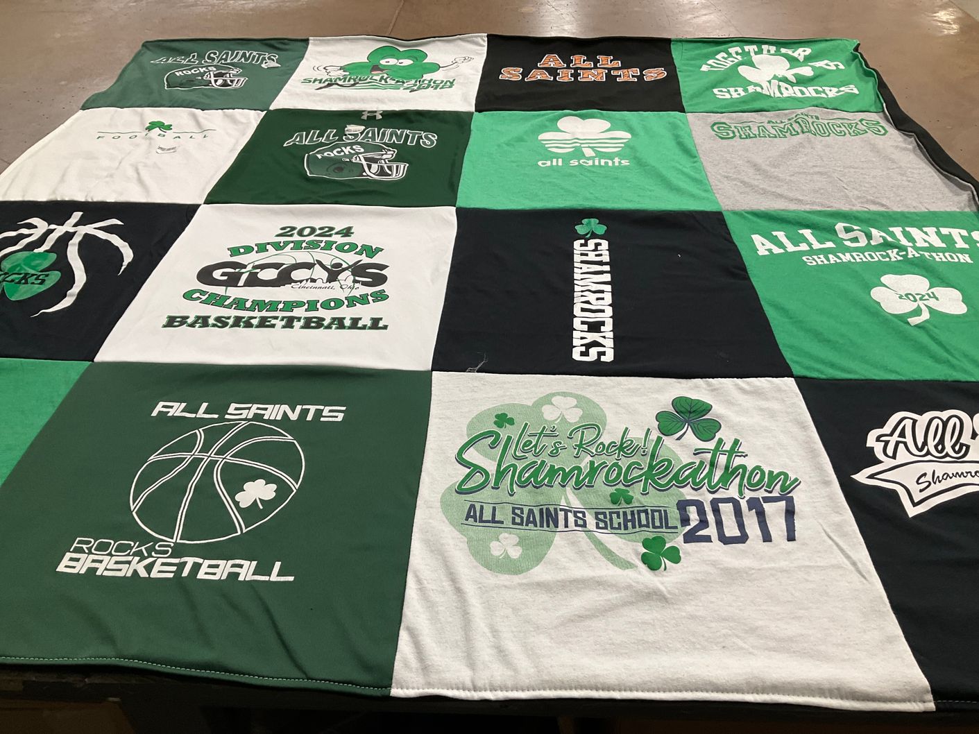T-shirt quilt featuring all saints basketball team, all saints football team by Carmen from OH