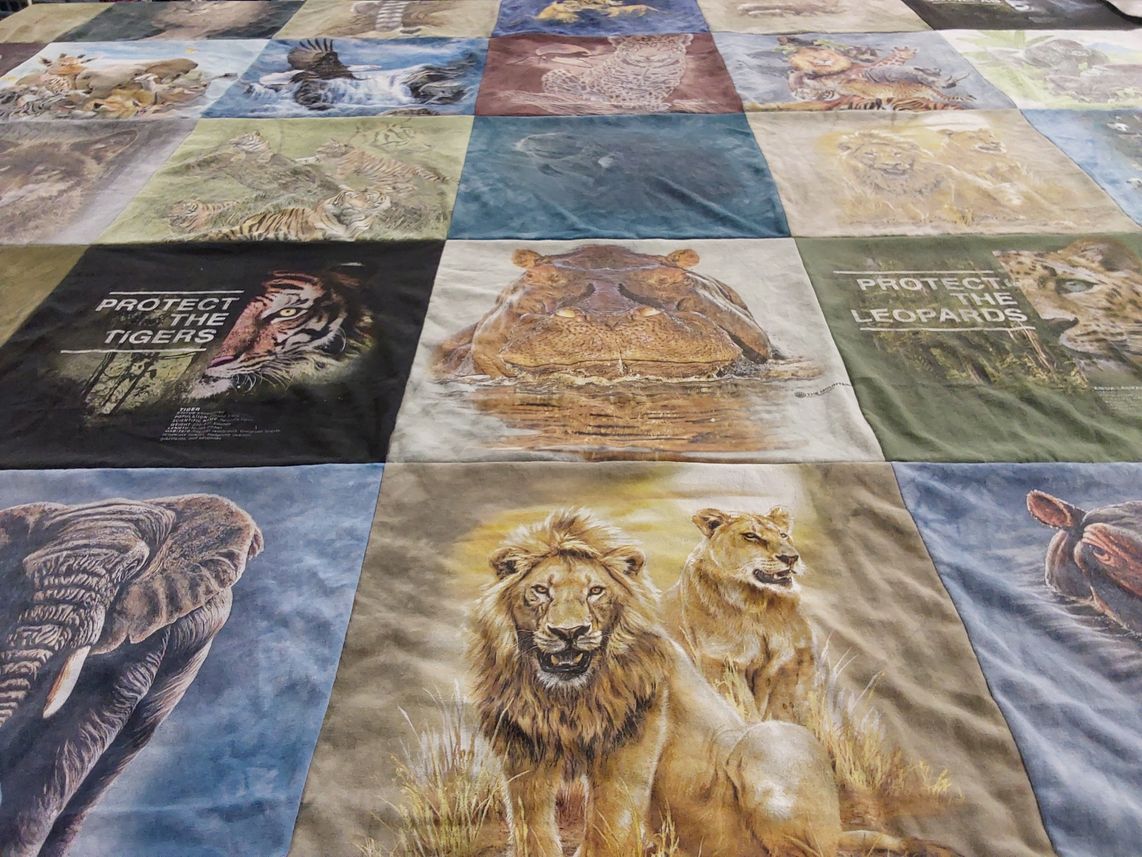 T-shirt quilt with wildlife conservation, animal protection themes by Kris from MN