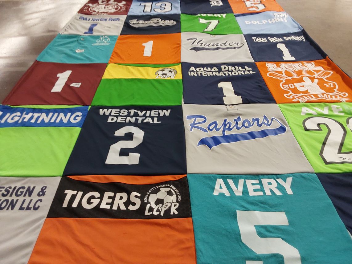 T-shirt quilt featuring raptors, tigers by Samantha from TX