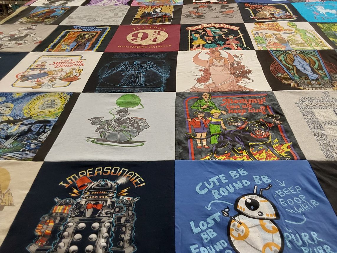 T-shirt quilt with movies, tv shows themes by Ruthanne from MO