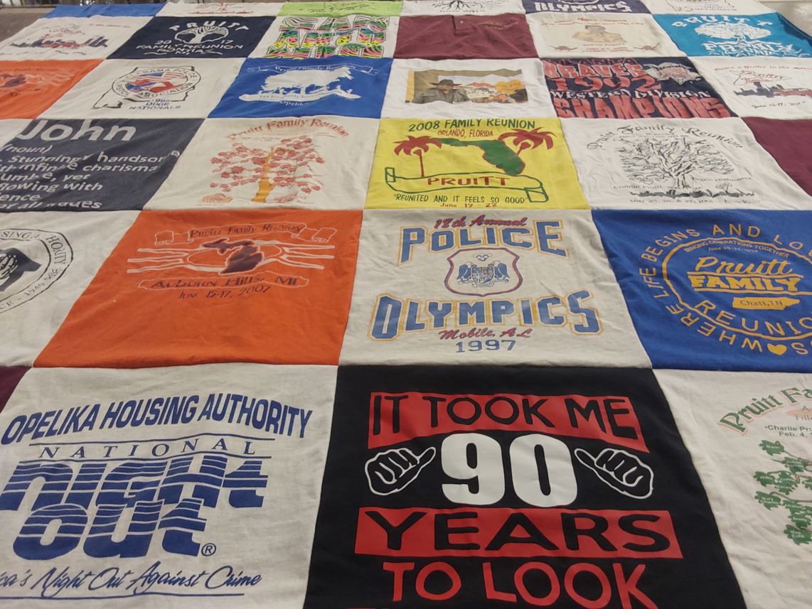 T-shirt quilt with family gatherings, community events themes by Carolyn from AL