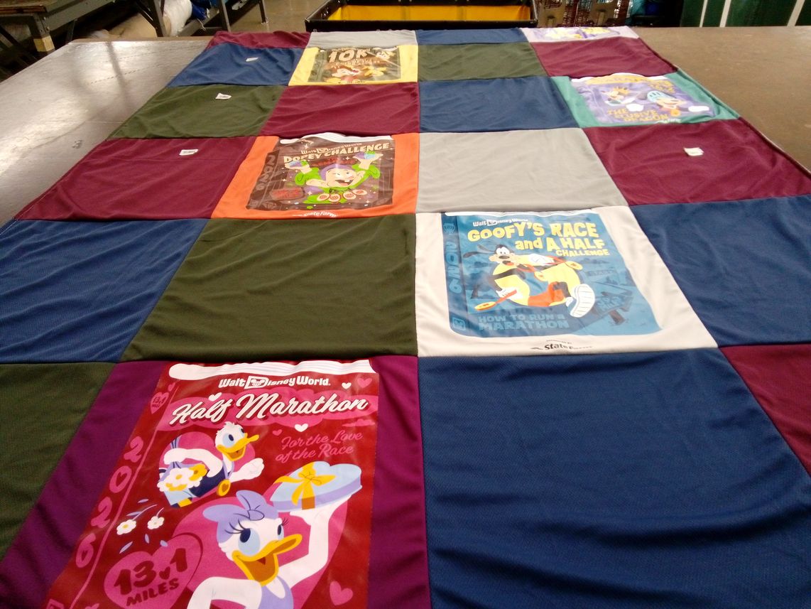 T-shirt quilt with running, disney themes by Charles from NC