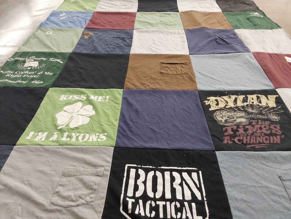 T-shirt quilt with music, cooking themes by Leslie from OH