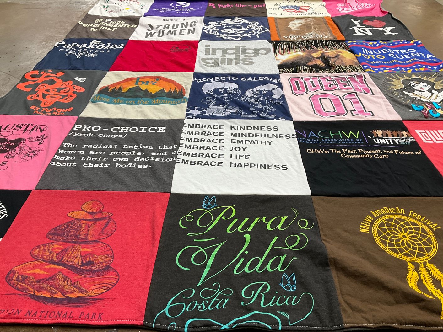 T-shirt quilt with advocacy, community themes by Julie from SC