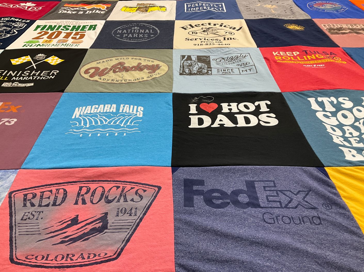 T-shirt quilt with travel, running themes by Krissy from OK