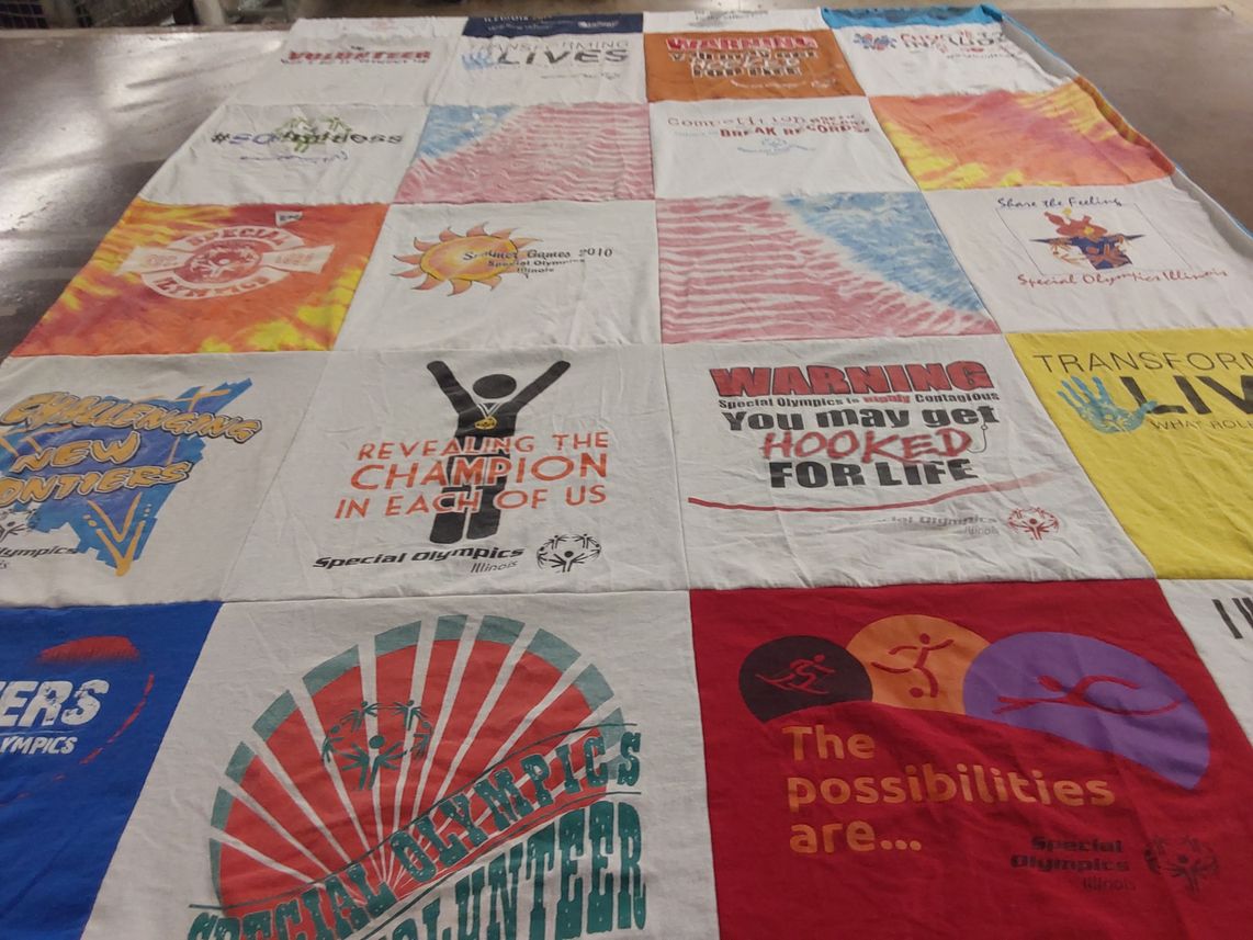 T-shirt quilt with community service, athletics themes by Meleia from IL