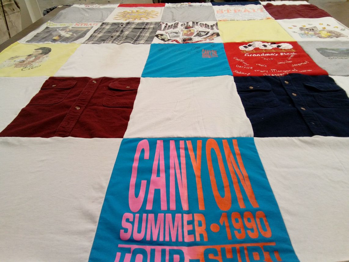 T-shirt quilt with music, travel themes by Linda from WY