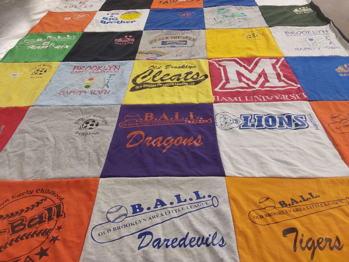 T-shirt quilt featuring dragons, lions by Jolee from OH