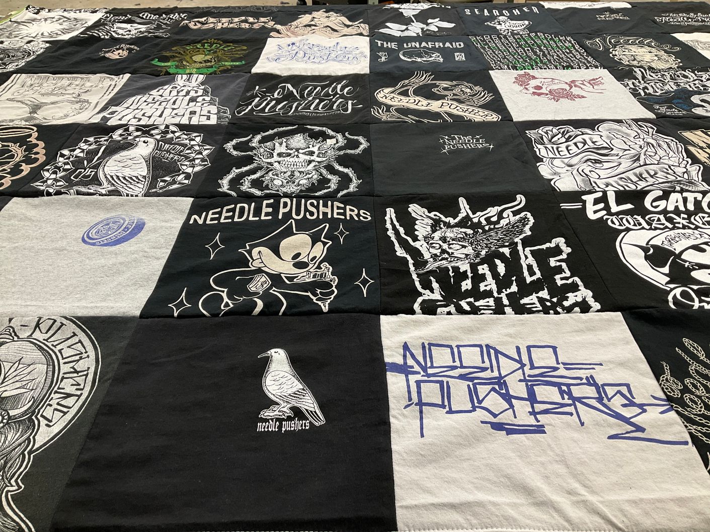 T-shirt quilt with tattoos, art themes by Adam from CA