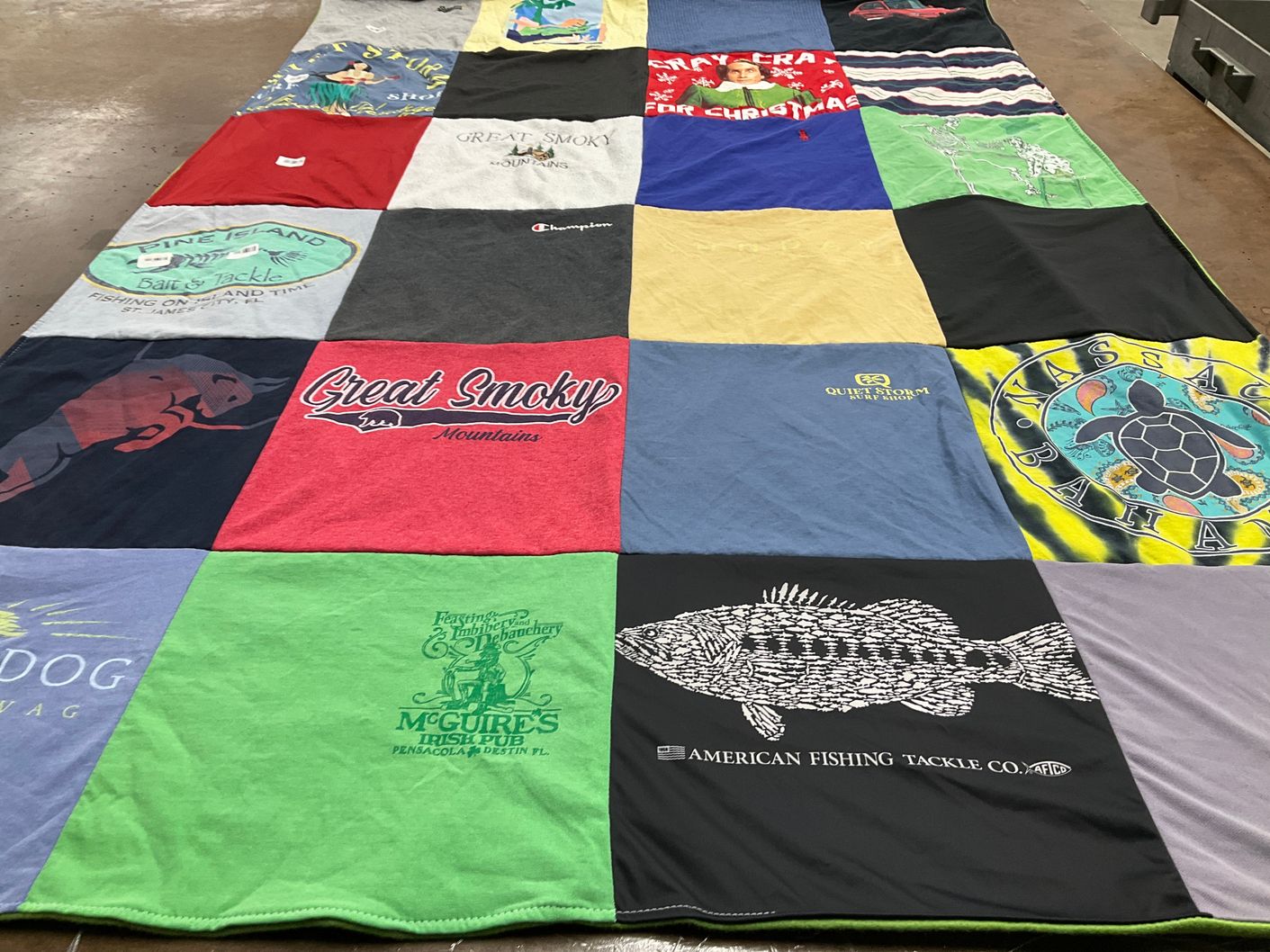 T-shirt quilt with fishing, travel themes by Kerri from FL