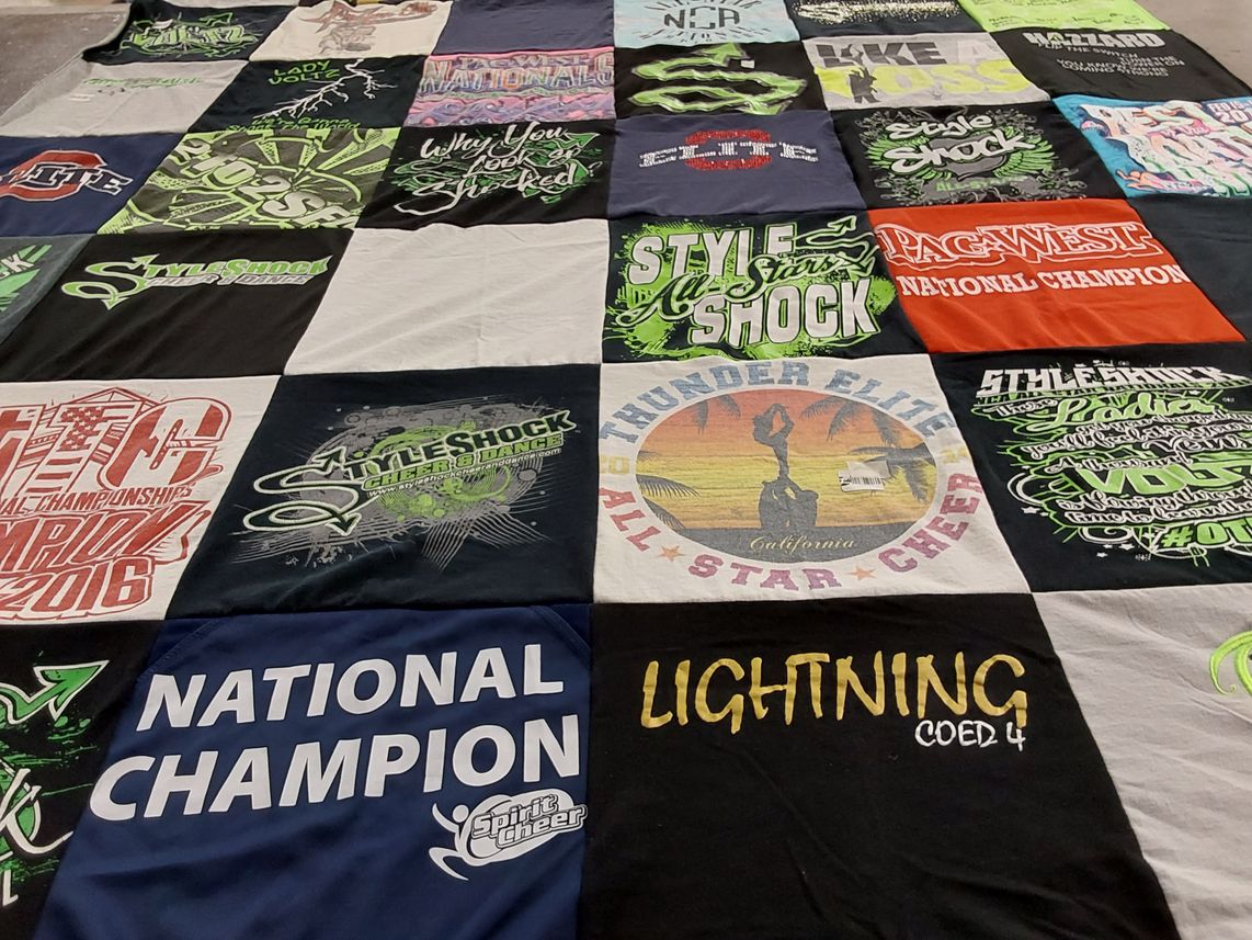 T-shirt quilt with cheerleading, dance themes by James from OR