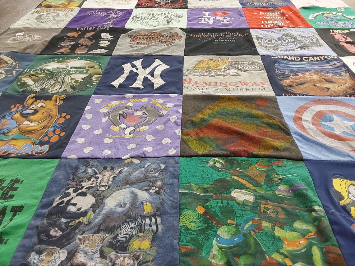 T-shirt quilt with wildlife, travel themes by Rhonda from FL