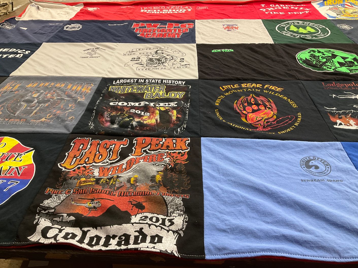 T-shirt quilt with wildlife, firefighting themes by Lori from AZ