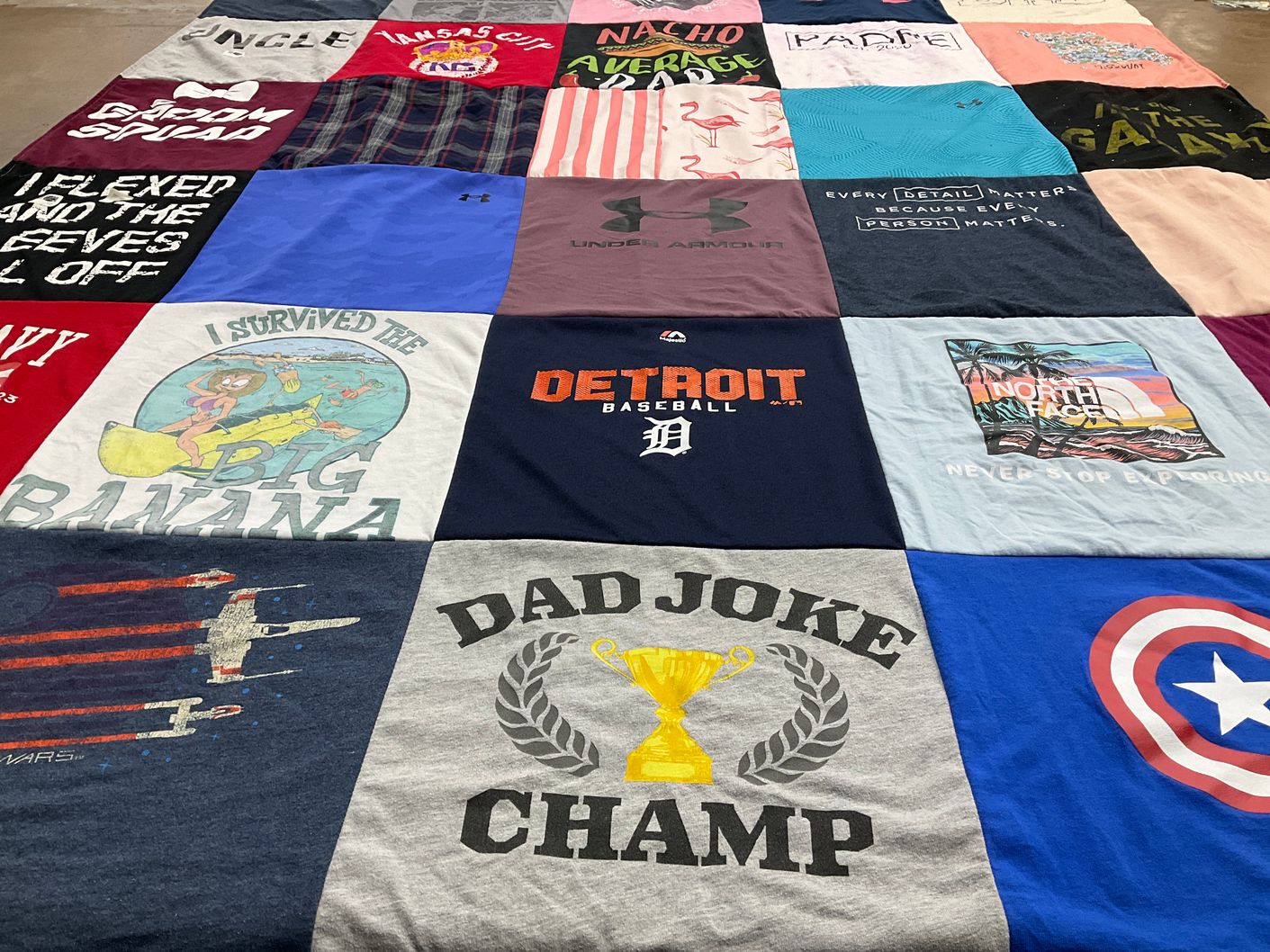 T-shirt quilt with humor, sports themes by Jody from MO