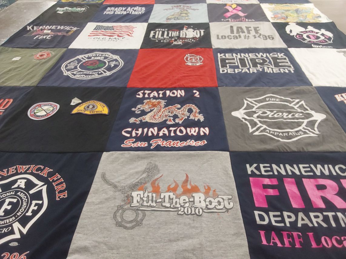 T-shirt quilt with firefighting, public service themes by Tracy from WA