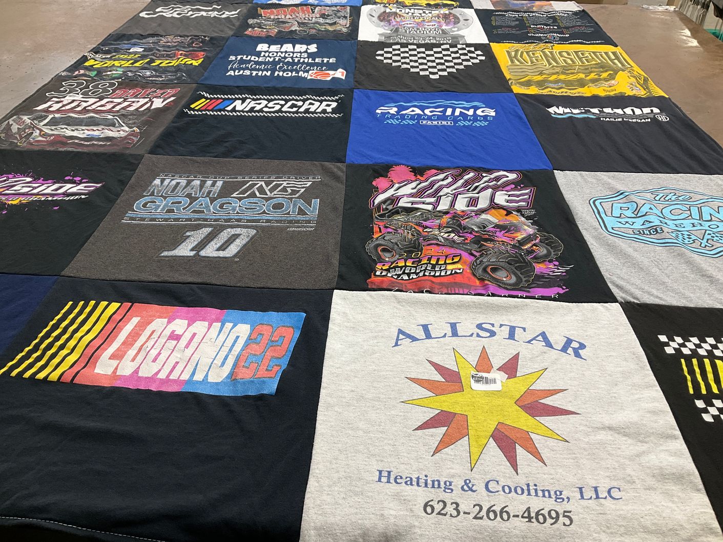 T-shirt quilt with racing, monster trucks themes by Amy from AZ