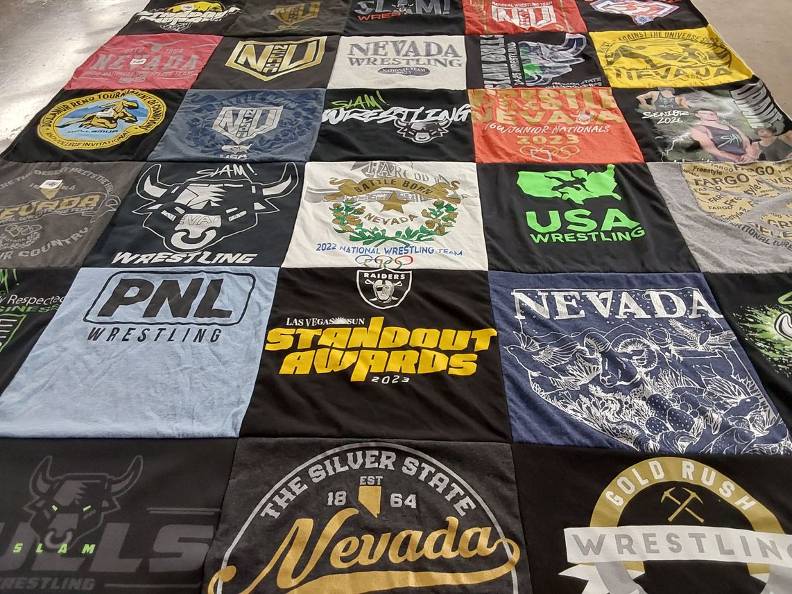 T-shirt quilt with wrestling themes by Tera from NV
