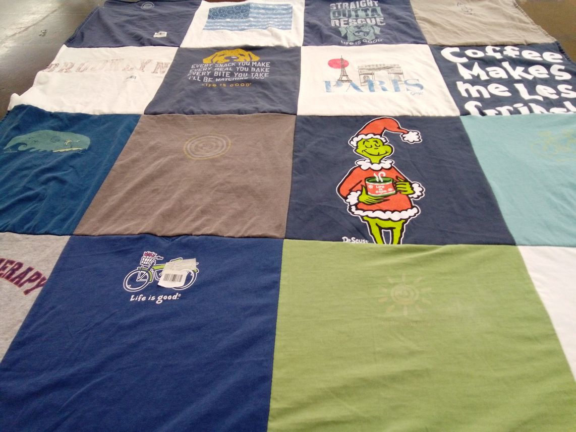 T-shirt quilt with reading, travel themes by Bree from FL