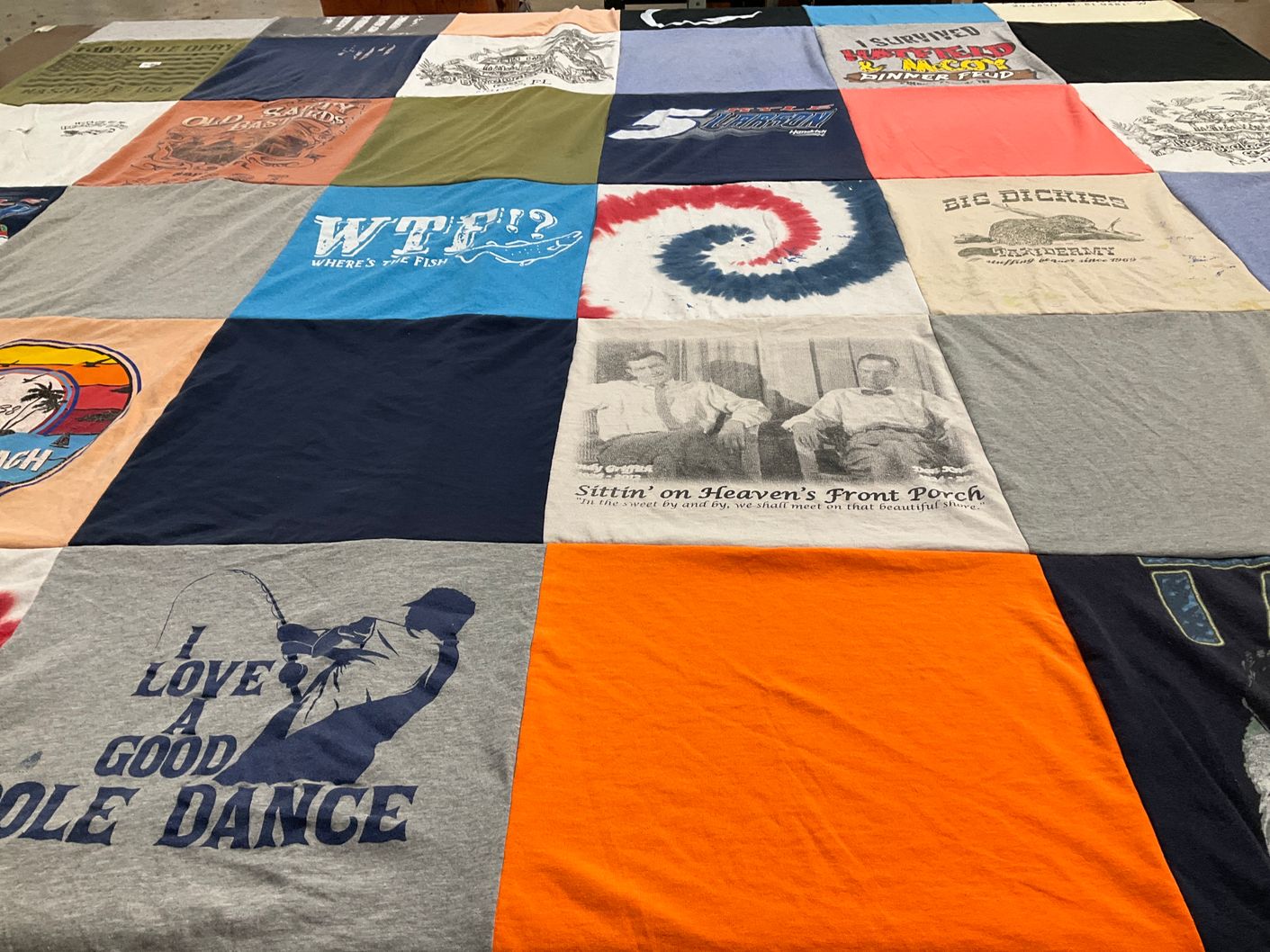 T-shirt quilt with fishing, outdoors themes by Sarah from VT
