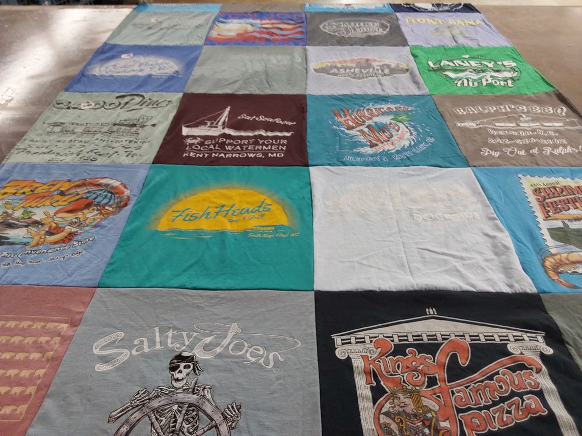 T-shirt quilt with cooking, food themes by Joan from NC