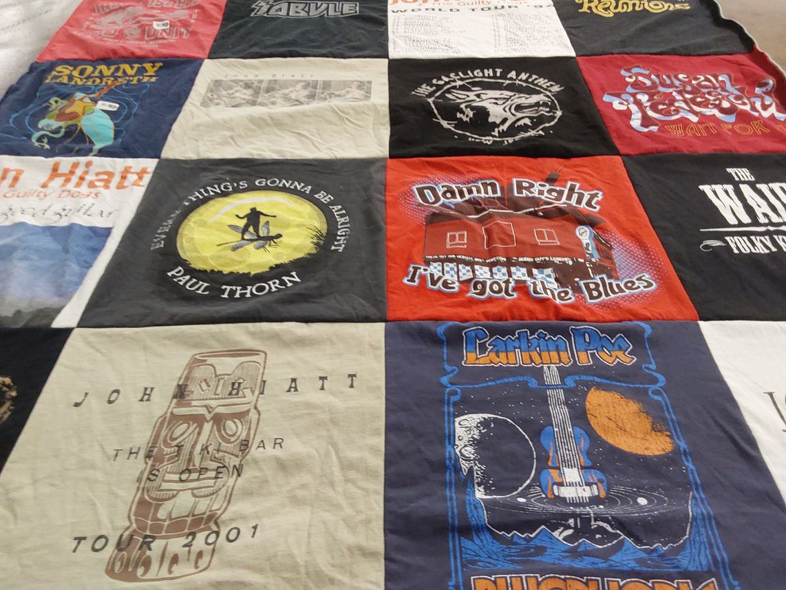 T-shirt quilt with music, concerts themes by Rick from NE