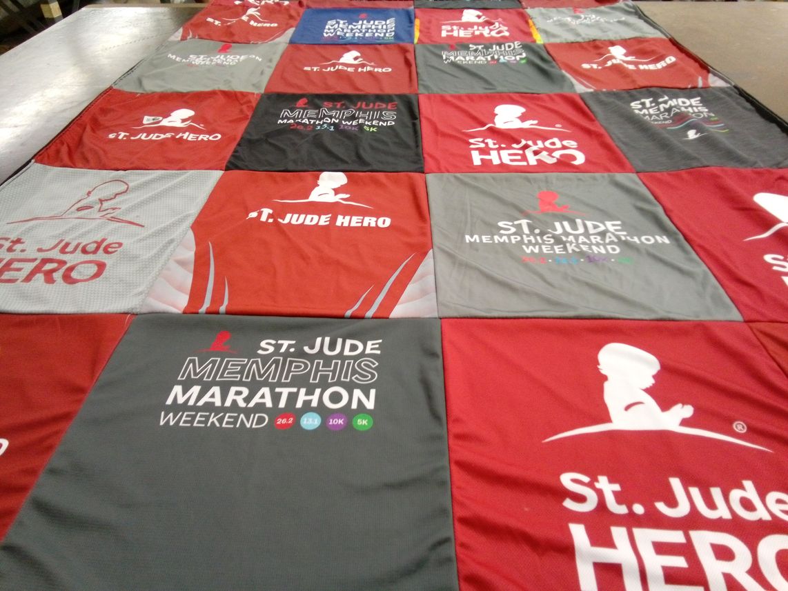 T-shirt quilt with running, charity themes by Deedra from TX