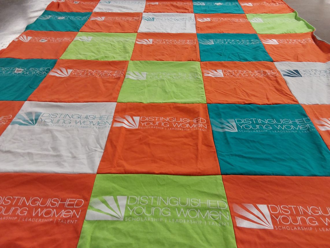 T-shirt quilt with scholarship, leadership themes by Gray from IL