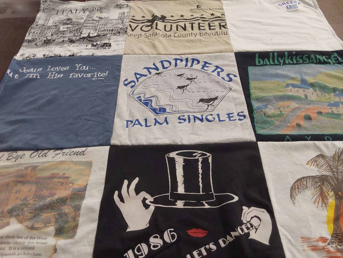 T-shirt quilt with travel, volunteering themes by Bette Lou from FL
