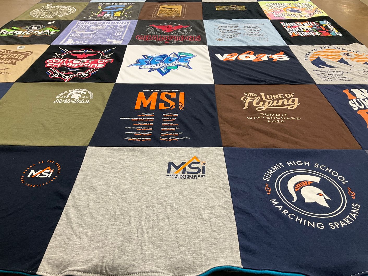 T-shirt quilt featuring summit high school marching spartans by Jennifer from TN