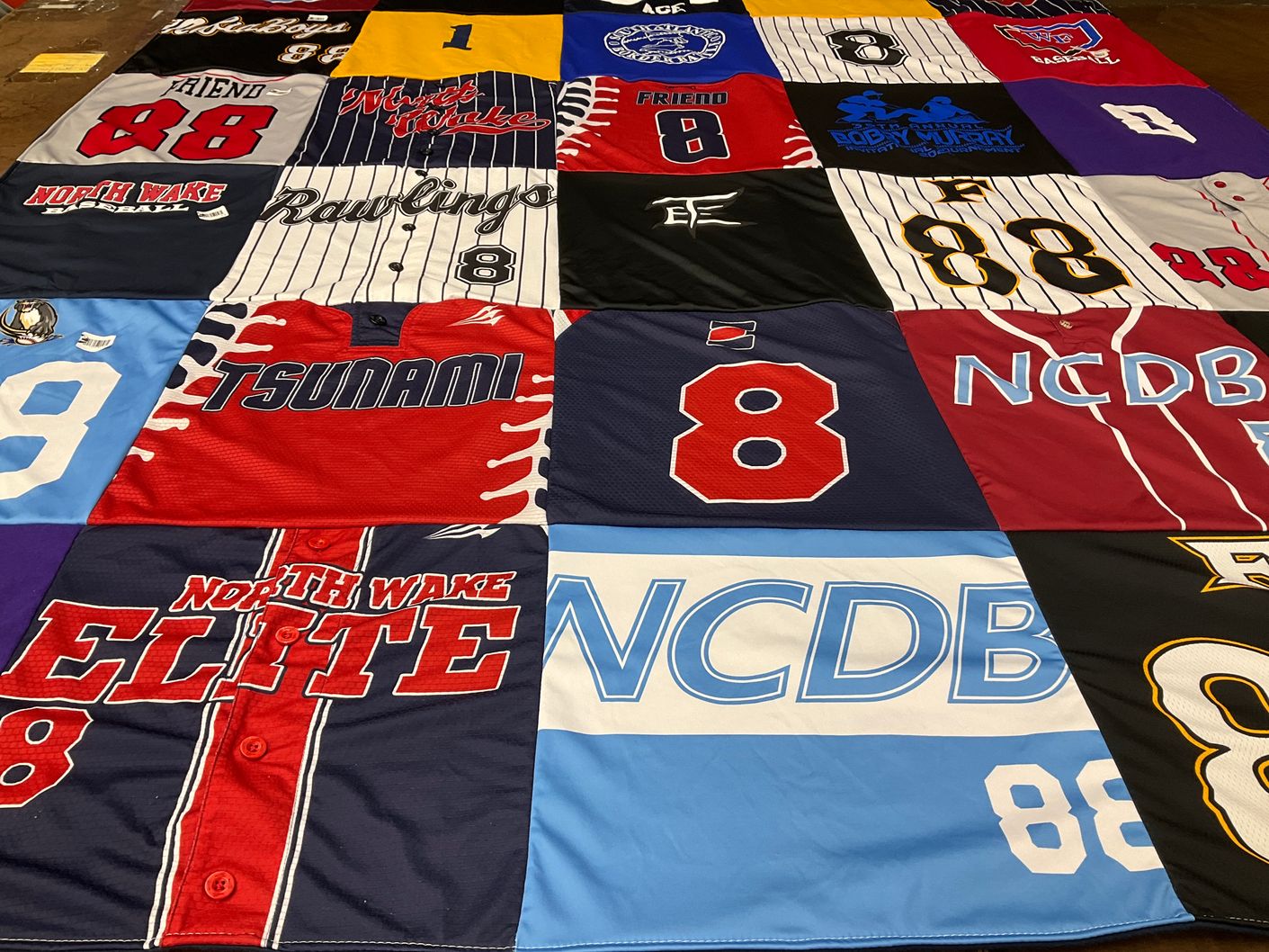 T-shirt quilt featuring north wake elite by Kelly from NC