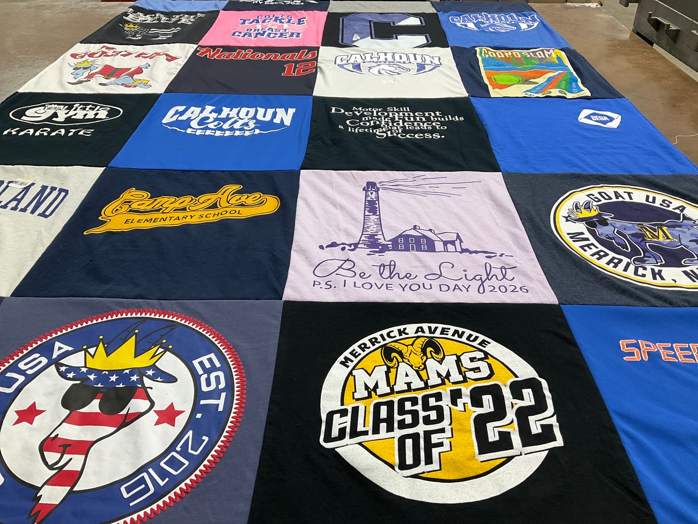 T-shirt quilt featuring calhoun colts, merrick avenue middle school by LISAMARIE from NY