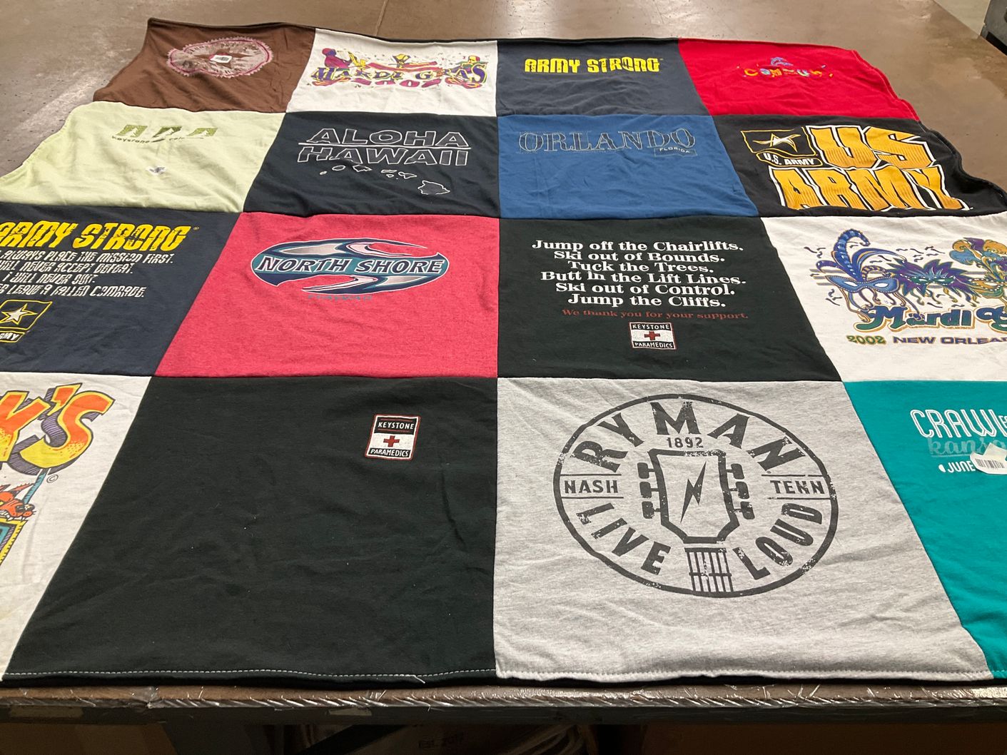 T-shirt quilt with travel, outdoor themes by Kelley from KS