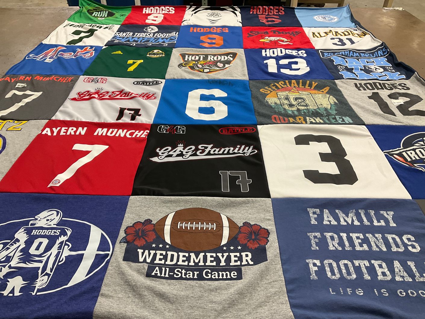 T-shirt quilt with football, community themes by Andrea from CA