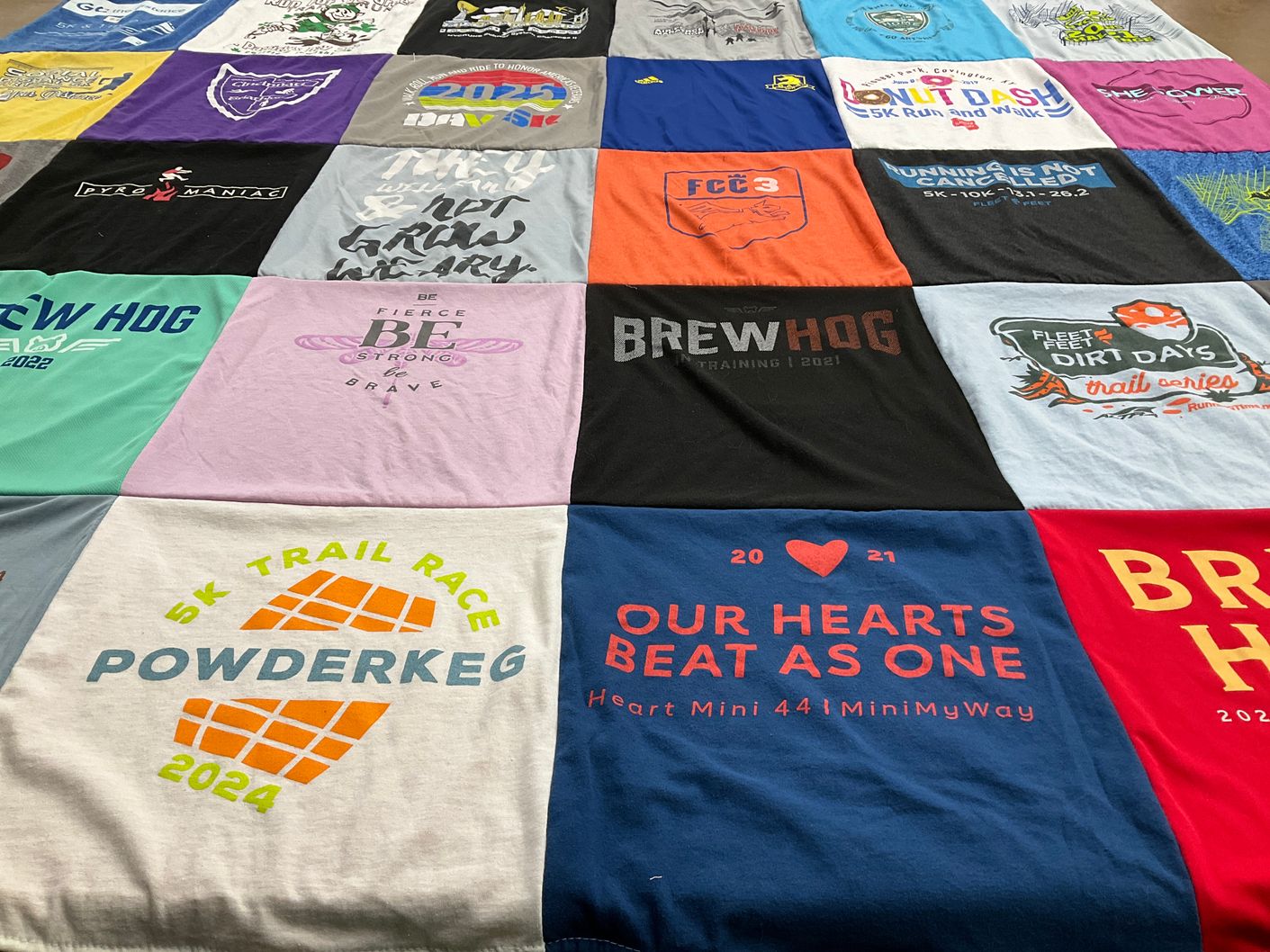 T-shirt quilt with running, walking themes by Shannon from KY