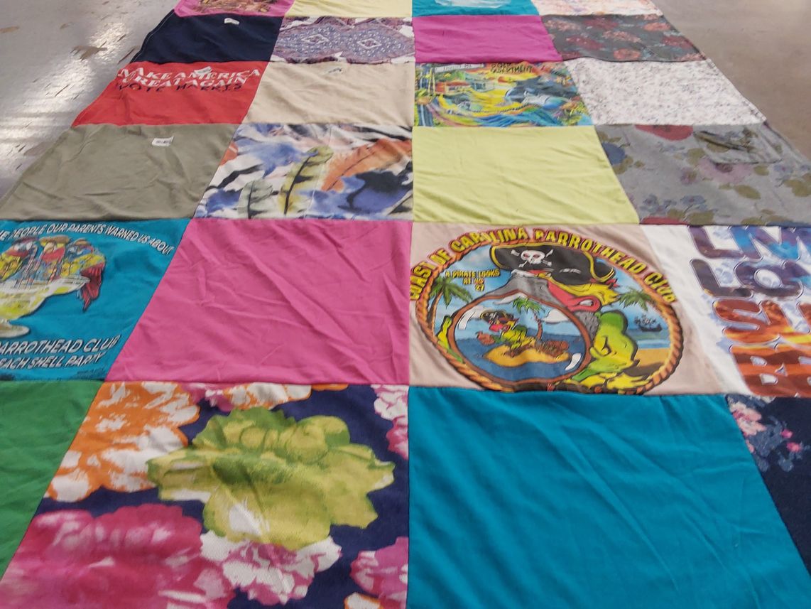 T-shirt quilt with beach parties, pirate themes themes by Nancy from SC