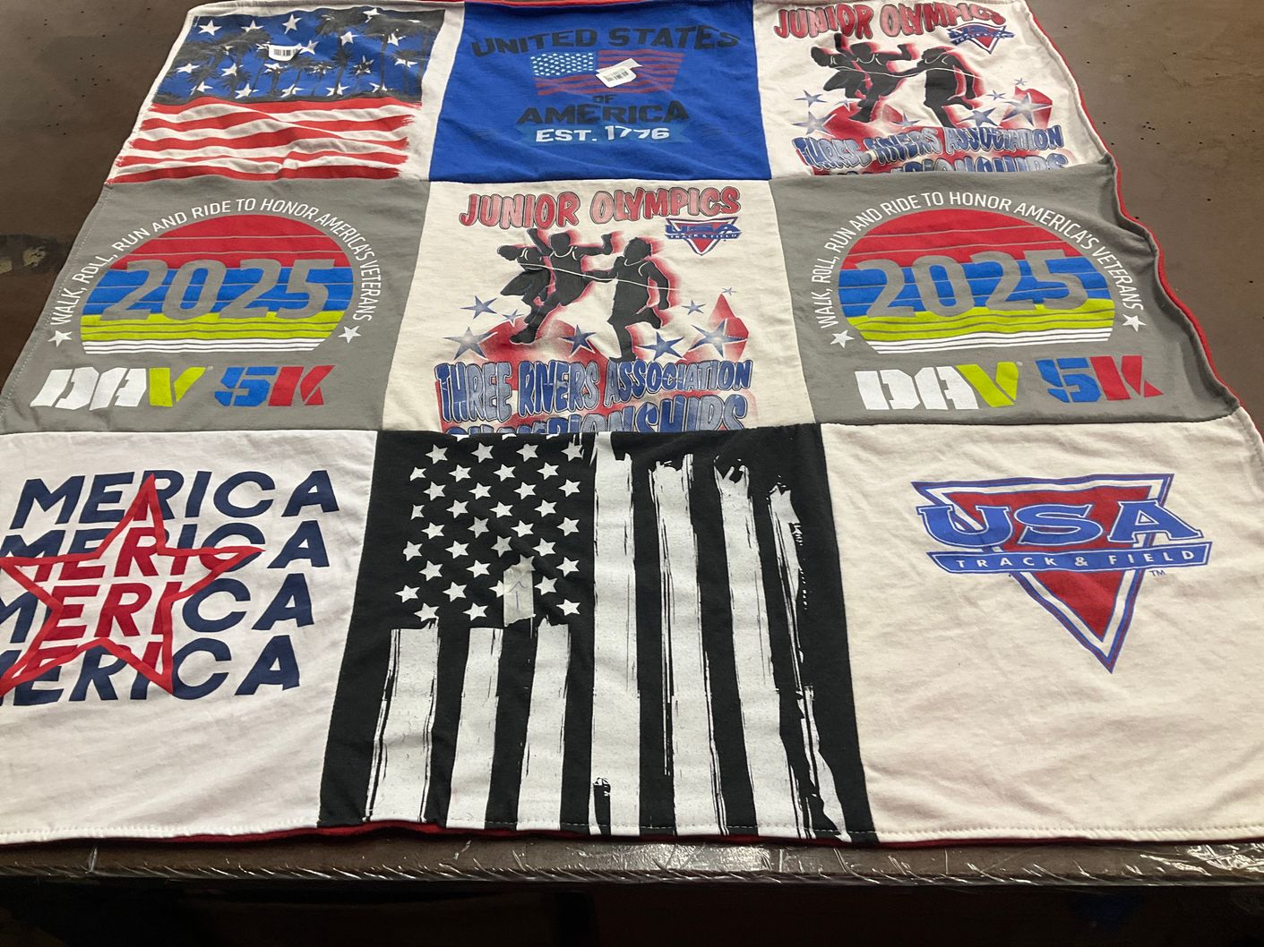 T-shirt quilt with veterans, running themes by CANDI from PA