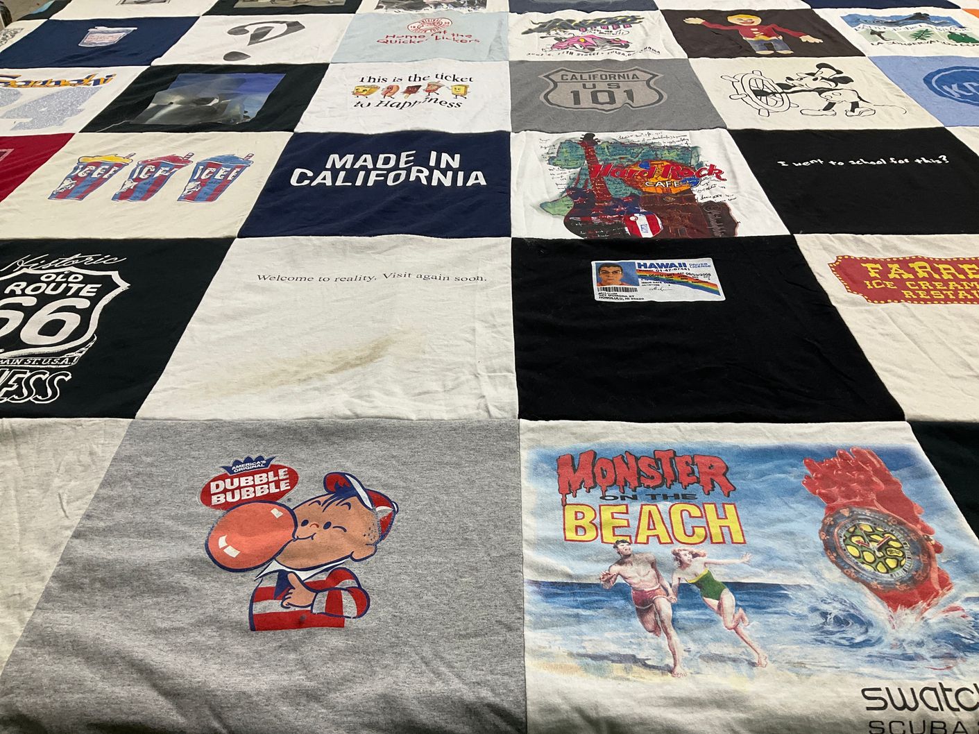 T-shirt quilt with travel, beach themes by Bill from CA