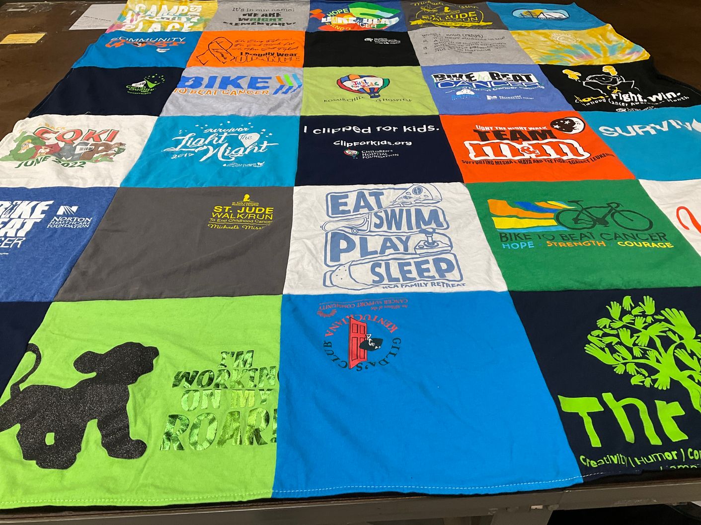 T-shirt quilt with fundraising, fitness themes by Spring from KY