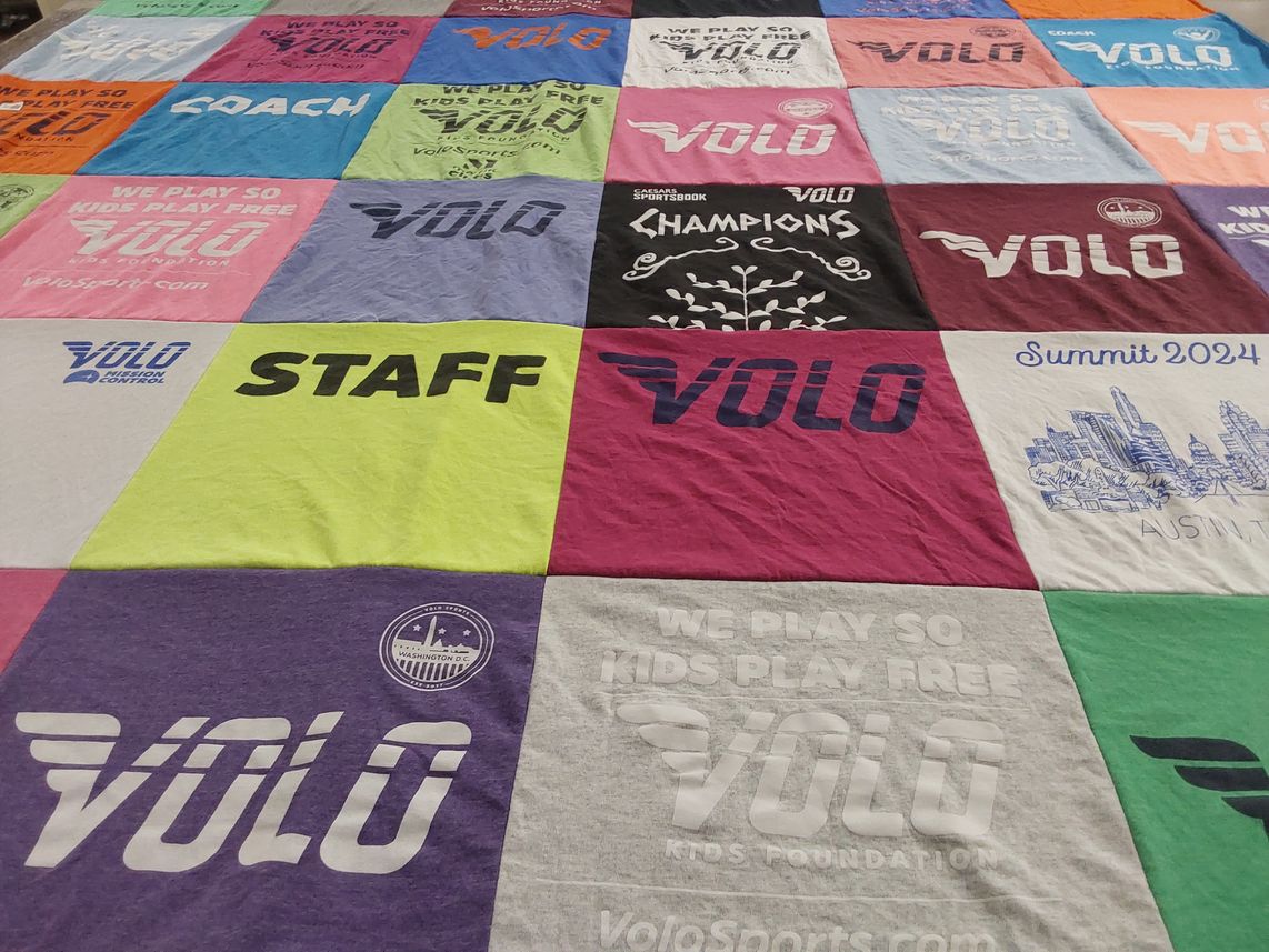 T-shirt quilt with sports, youth programs themes by Perrin from CO