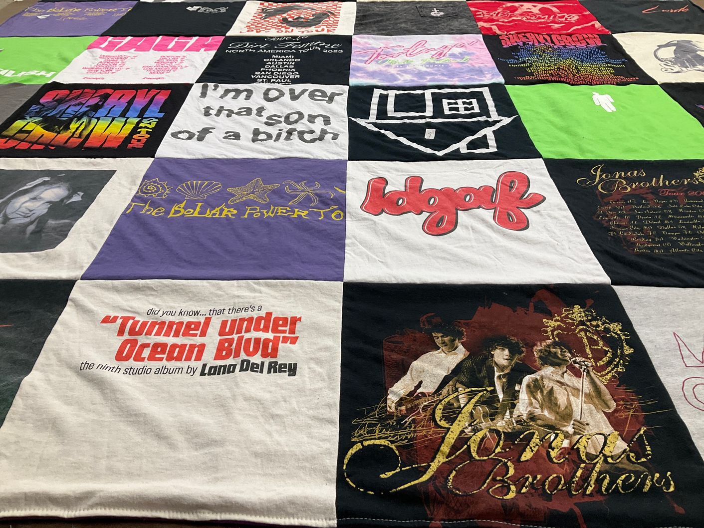 T-shirt quilt with music, concerts themes by Sydney from FL