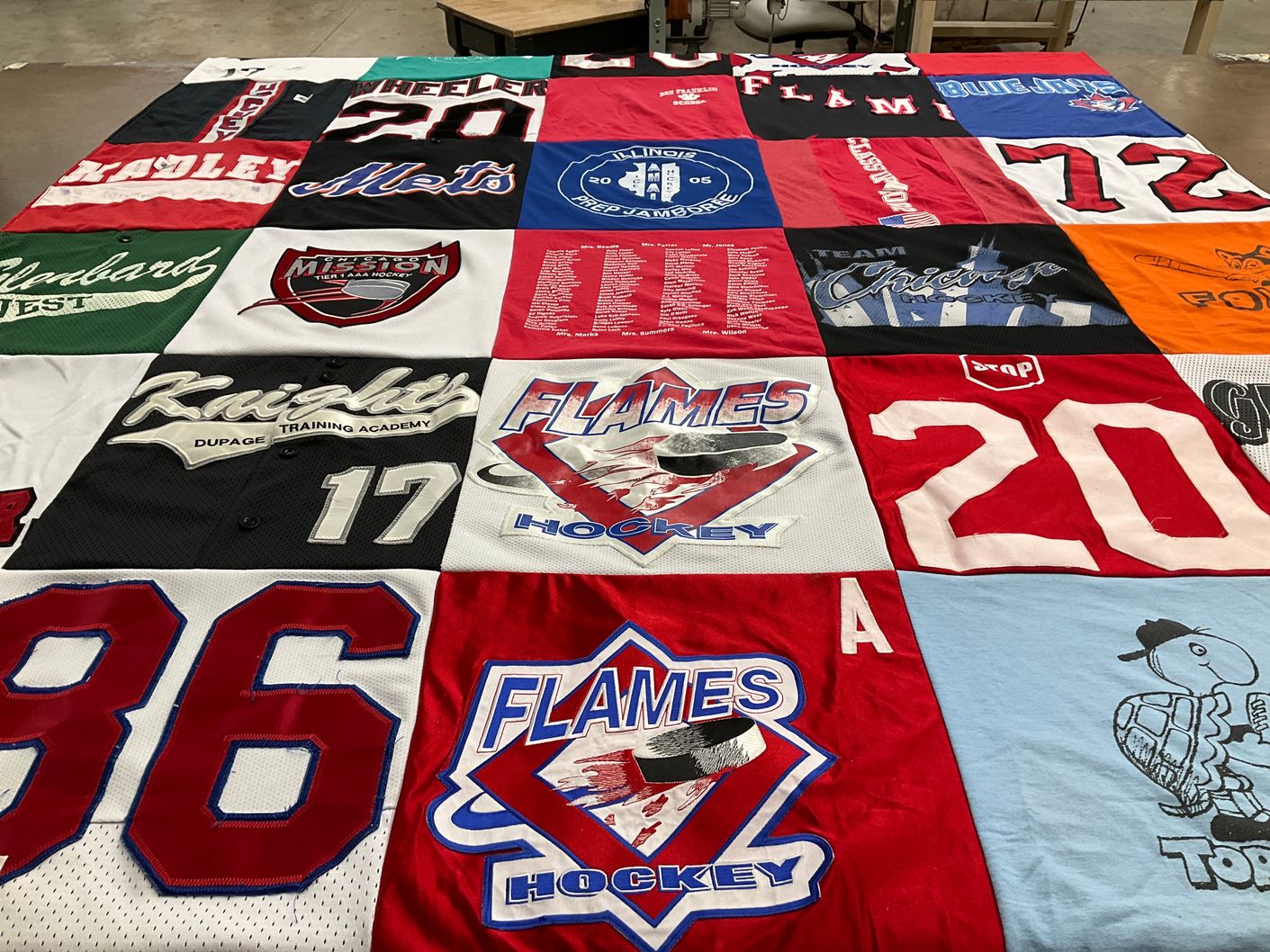 T-shirt quilt featuring flames hockey by Jennifer from IL