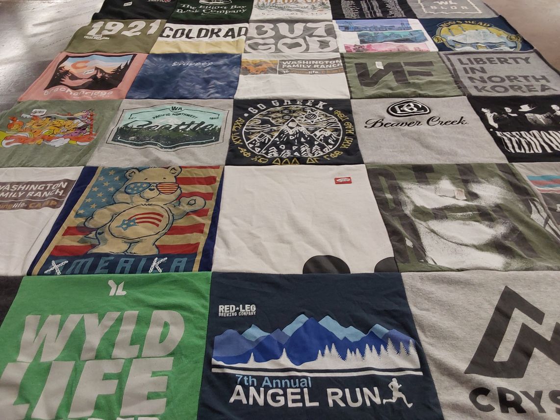 T-shirt quilt with outdoors, running themes by Rachel from CO