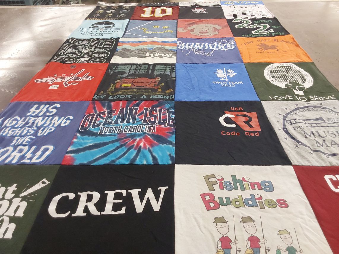 T-shirt quilt with fishing, swimming themes by Michele from VA